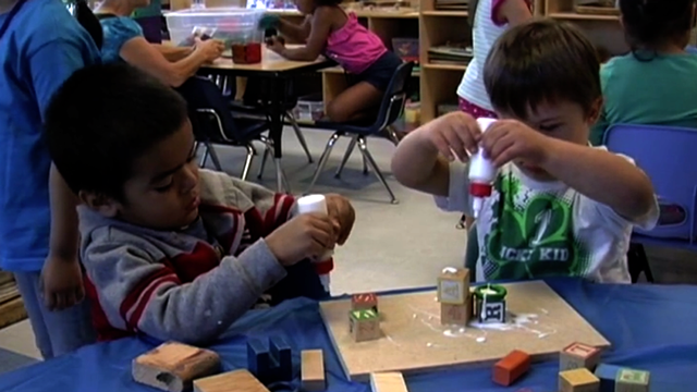 Cody Plays with Glue and Wood